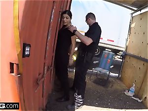 bang the Cops Latina nymph caught deep throating a cops pipe